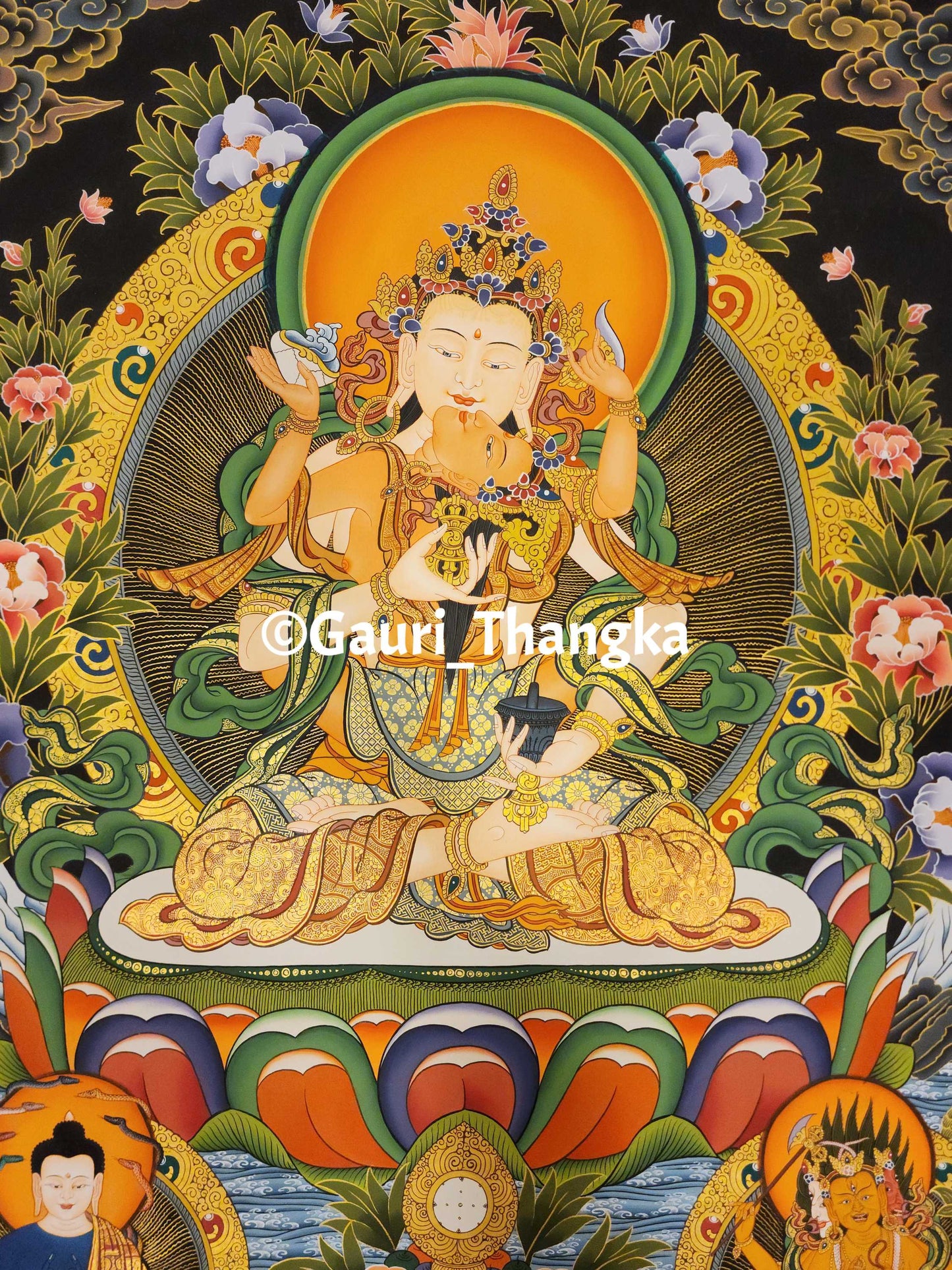 Colorful Thangka painting of a deity with intricate border and floral elements, featuring the Gauri Thangka brand.